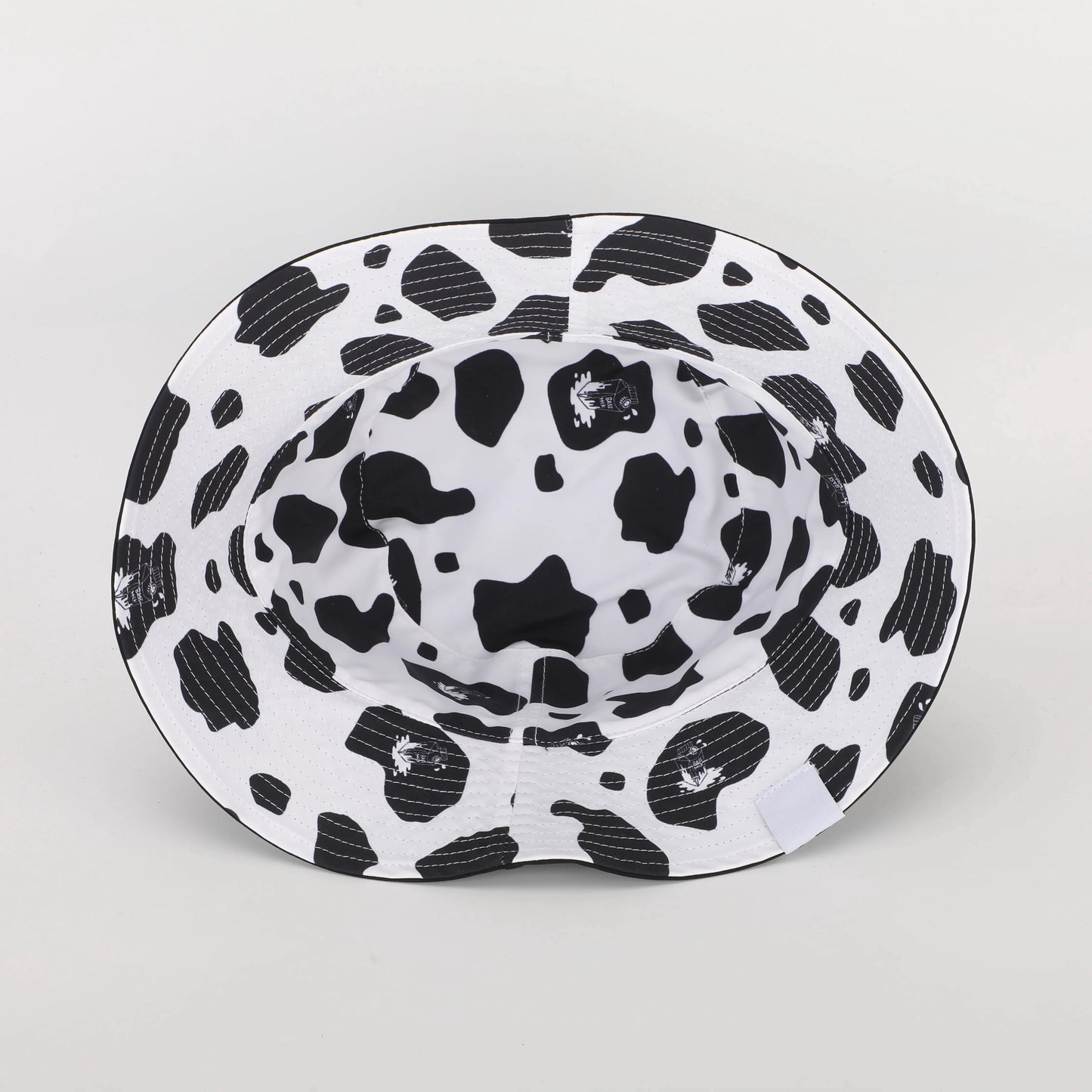 BASSMILK COW PRINT BUCKET HAT (PRE-ORDER ONLY)